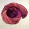 Skein of Truth Teller, a rose/magenta/peach yarn