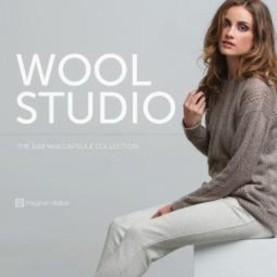 The book cover of "Wool Studio," which features a seated woman in a knitted, beige sweater.